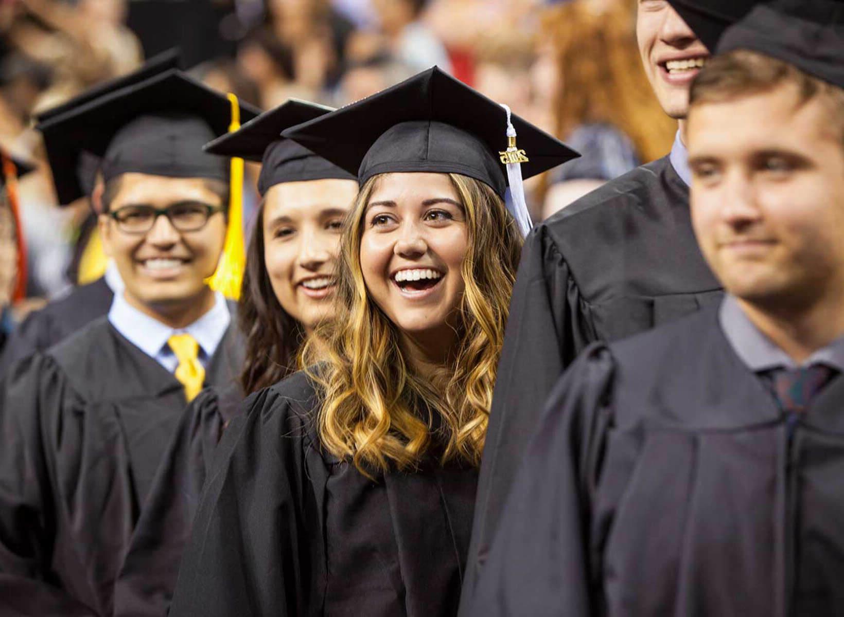 SPU undergraduate students in their caps 和 gowns during Commencement